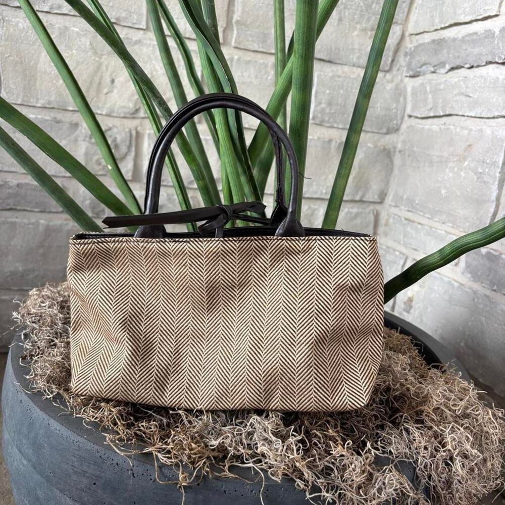 Tan and black herringbone patterned bag and pouch